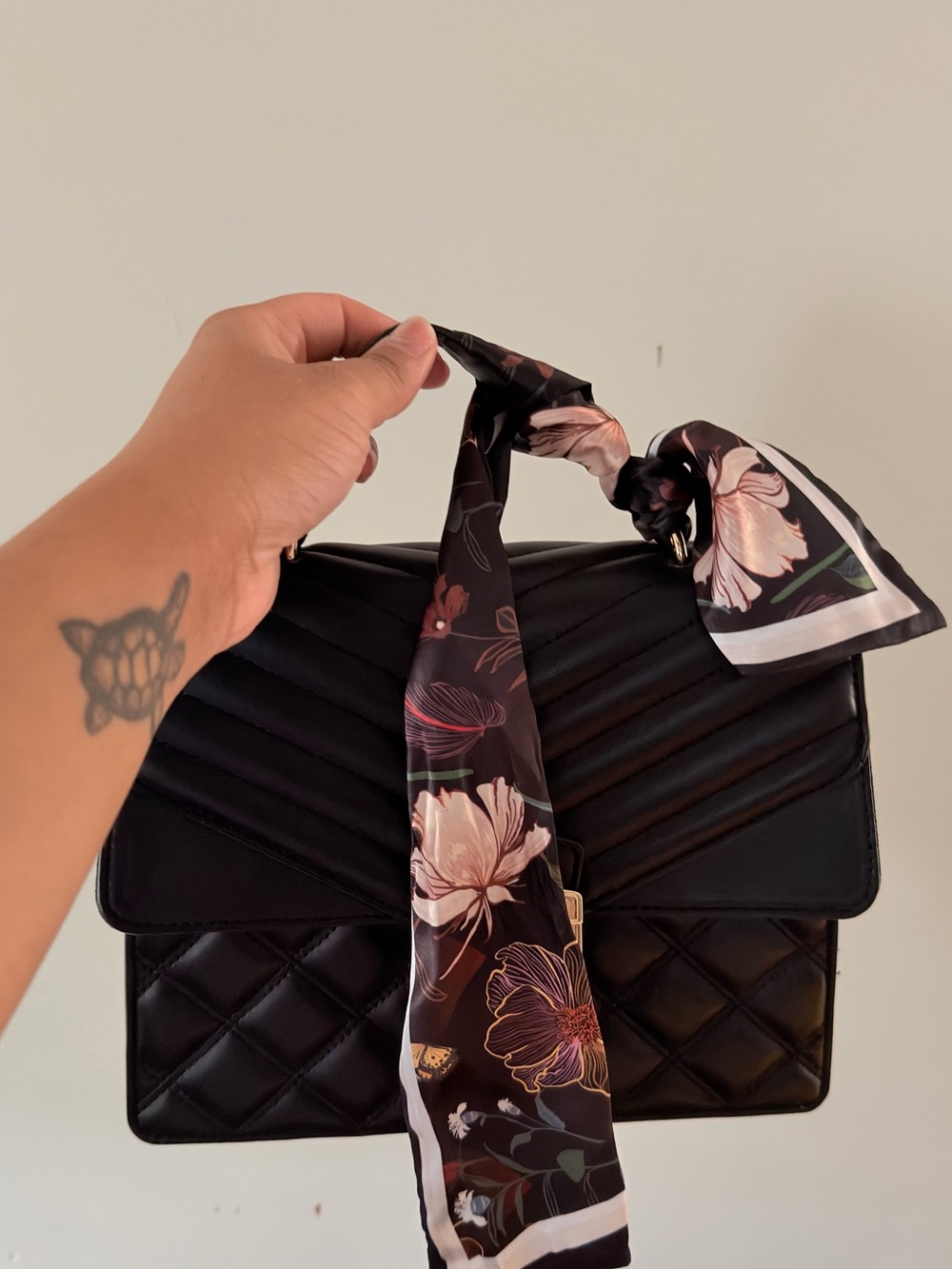 Aldo Black Quilted Shoulder Bag with Floral Scarf Accent